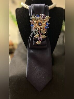 Navy blue tie with Floral Brooch with Blue and and gold accents